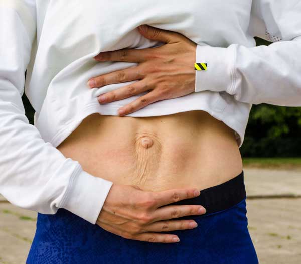 How Does Liposuction Help with Lower Belly Fat?